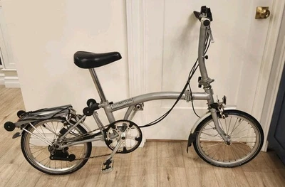 Brompton S6R Folding Bike – 6 Speed Sturmey-Archer Hub + Rear Rack – Silver - Image 1 of 4