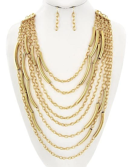 Collar y pendientes de varias filas en tono dorado Foto 1 de 2