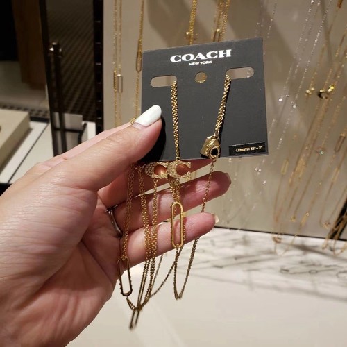 Collana lunga firmata Coach Pave