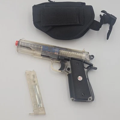 Pistola de mão Colt Delta Elite Airsoft BB transparente réplica oficial funcionando - Imagem 1 de 4
