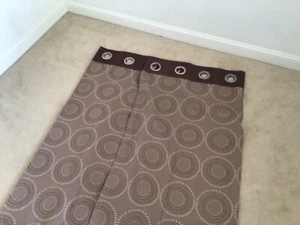 Brown unlined eyelet Curtain’s with circle pattern. 44” 72” - Picture 1 of 3