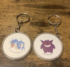 Vintage 2000 Pokémon Nintendo Keychains Gyarados and Gengar Plastic Coins - Picture 1 of 7