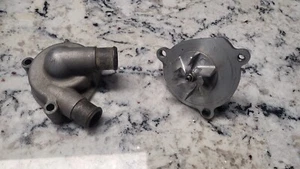 2006 HUSQVARNA TE250 OEM WATER PUMP + MOUNT COVER ASSY TE 250 - Picture 1 of 2