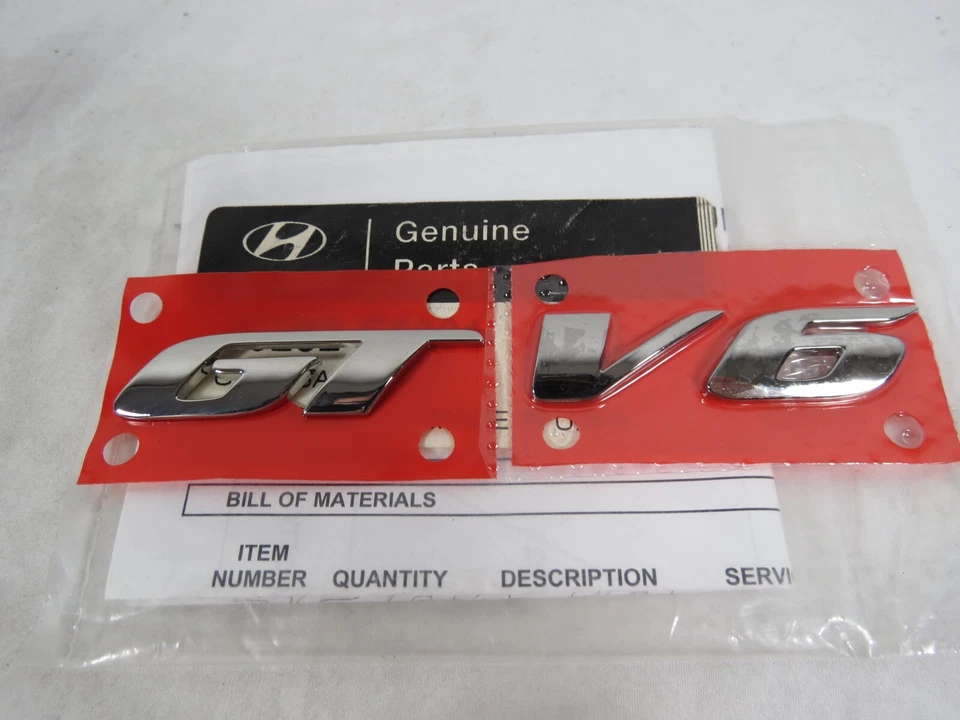 2003-2008 Hyundai Tiburon GT V6 Emblem For Rear Trunk Badge Symbol Genuine OEM - Image 1 of 3