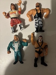 4 Hasbro 90er Wrestling Figuren - Bild 1 von 2
