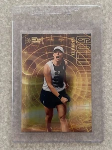 Iga Swiatek 2023 Skybox Metal Universe Champions Gold Universe #GU-3 - Picture 1 of 2