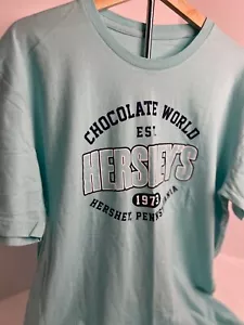 Light Teal Size L HERSHEY'S CHOCOLATE WORLD T-SHIRT Est. 1973 Hershey, PA NWT! - Picture 1 of 5