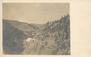 Buildings in a Valley aerial view Forest Rural Scene RPPC Postcard - Picture 1 of 2