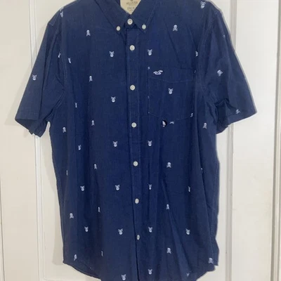 Мужская рубашка Hollister Epic Flex эластичная на пуговицах темно-синяя с принтом в виде черепа размер XL - Изображение 1 из 4