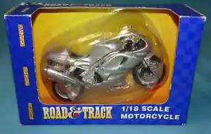 31026 MAISTO Road & Track 1/18 Scale Motorcycle Silver grey Triumph Daytona 955i - Picture 1 of 7
