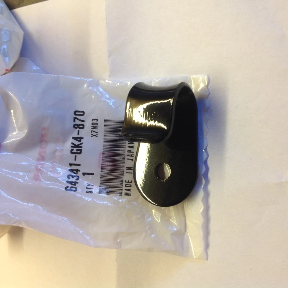 Gancho de equipaje genuino nuevo Honda C50 C70 C90 Cub 12 voltios 64341-GK4-870 Foto 1 de 1