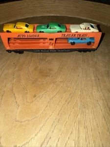 Tyco Autoloader Treno Rimorchio con 4 Auto SF-2530. Usato. Senza scatola F1 - Foto 1 di 4
