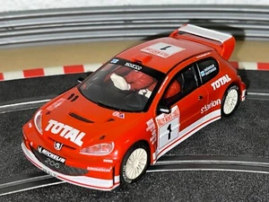 1075-Scalextric TecniToys PEUGEOT 206 WRC #1 TOTAL Gronholm Rautiainen 1:32 slot - Picture 1 of 3