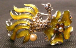 Pulsera amarilla esmaltada y brillo pájaro y flor en tonos plateados - Imagen 1 de 6