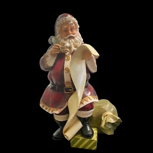 Santa checking his list - Picture 1 of 9