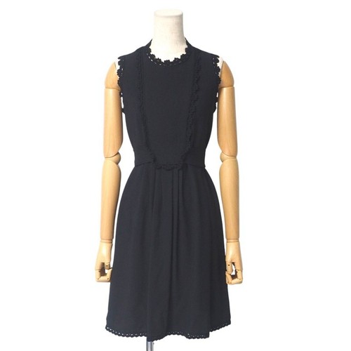 PRADA come nuovo pezzo unico taglia 40 senza maniche nastro posteriore passamaneria all'uncinetto Made...