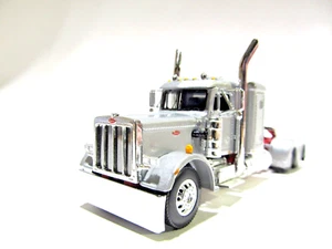 DCP / FIRST GEAR 1/64 SCALE 359 PETERBILT SMALL BUNK, SILVER WITH RED FRAME - Picture 1 of 6