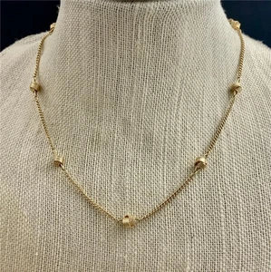 Vintage 70's Avon Gold Tone Knot Necklace Station Necklace 18.5" Long - Picture 1 of 3