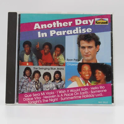 Musik CD | Another Day in Paradise | Disc poliert - Bild 1 von 2