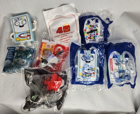 Lot of 8 McDonald’s Happy Meal Toys Star Wars, Mickey Mouse, Frozen, Hasbro Cover