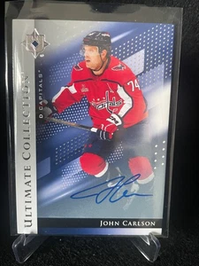 24-25 ULTIMATE COLLECTION SILVER AUTO - JOHN CARLSON #32 WASHINGTON CAPITALS - Picture 1 of 1