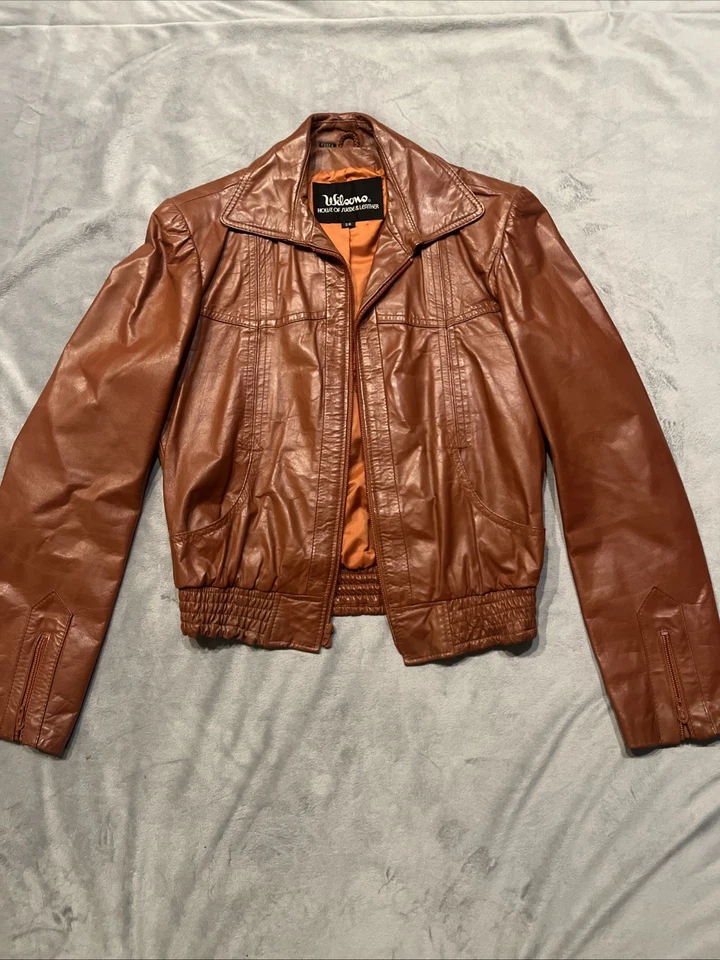 Chaqueta de cuero tostado East West Musical Instruments vintage años 70 interior de gamuza L Foto 1 de 4