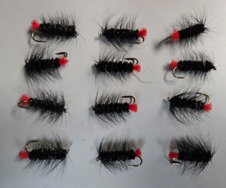 Moscas pretas Umpqua Wolly Worm 12 peças.  Tamanho 6 28837 - Imagem 1 de 1