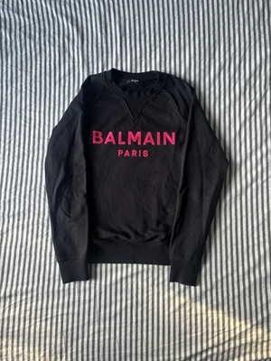 Moletom Balmain rosa soletrar gola redonda, marcado A Xs - Imagem 1 de 4