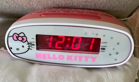 Hello Kitty AM/FM Dual Alarm Clock Radio/Hello Kitty Napkins. Tested - Works! Cover