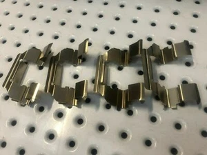GENUINE FRONT BRAKE PAD ANTI SHUDDER - RATTLE SHIM SET FORD FALCON BA BF XR6-8. - Picture 1 of 5