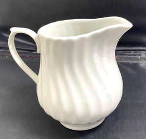 Gibson Designs Housewares White Porcelain 10 oz Creamer In The Sea Shell Pattern - Picture 1 of 5