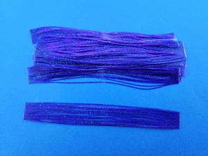 10 Silikon Rock Tabs JuneBug lila grün Glitzer Fischköder T60 Spinnerbait Buzz - Bild 1 von 1