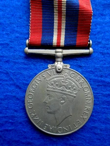 ORIGINAL WWII 1939-45 WAR MEDAL WITH RIBBON, FULL SIZE - Picture 1 of 4