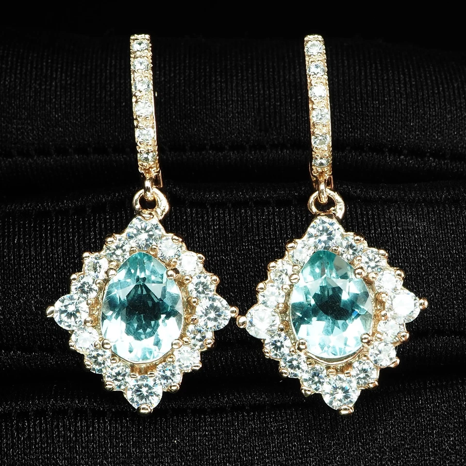 Pendientes de oro rosa de plata de ley 925 de 4,02 quilates y aguamarina azul cristal aterciopelado Foto 1 de 4