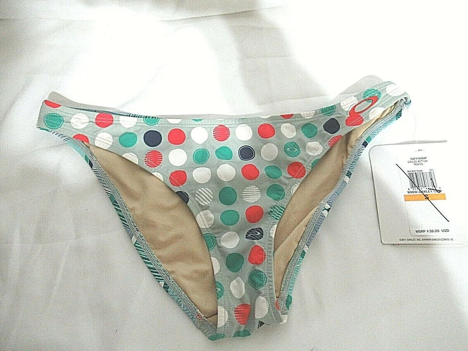 Parte inferior de bikini Oakley gris circular para mujer natación calce medio pequeño pequeño Foto 1 de 3