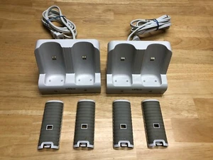 Nintendo Wii 2 Nyko Charge Stations + 4 Rechargeable Battery Pack Covers - Picture 1 of 4