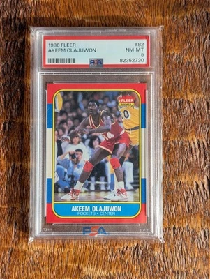Fleer Akeem Olajuwon #82 Rockets 1986 PSA 8 casi nuevo-como nuevo Houston Rockets Foto 1 de 2