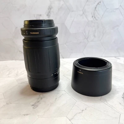 Lente tele-macro para cámara Tamron 100-300 mm F5-6,3 montura Canon AF con capucha funcionando Foto 1 de 4