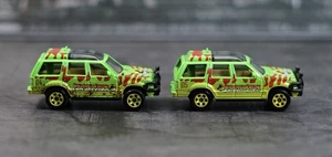 Matchbox 2018 Jurassic World Muddy 1/64 '93 Ford Explorer #4 & #5 FMX26 - Picture 1 of 4