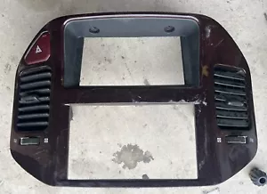 01-06 MITSUBISHI MONTERO LIMITED CENTER DASH RADIO BEZEL AIR VENT TRIM WOODGRAIN - Picture 1 of 3