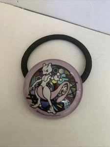 Nintendo / Pokemon Mew �� Juwelen Emblem auf elastischem Haarband - Bild 1 von 5