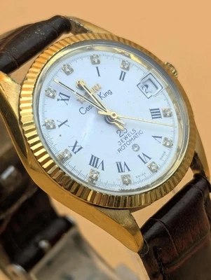 TITONI COSMO KING 25 JOYAS CALENDARIO AUTOMÁTICO SUIZO MARCADORES DE DIAMANTES Foto 1 de 4