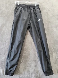 Pantalones de chándal para mujer Nike pequeños negros de nailon cintura elástica cordón forrados de malla - Imagen 1 de 6