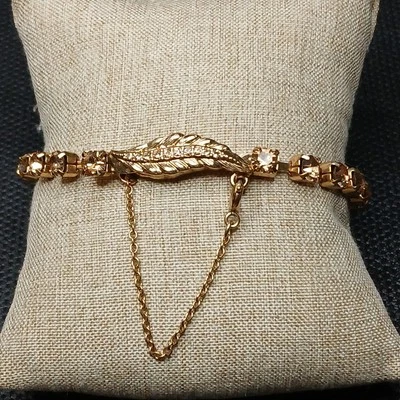 Pulsera vintage MONET imitación topacio broche en forma de hoja tono dorado. 14.524 Foto 1 de 4