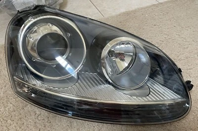 Faro derecho de pasajero proyector Hella 2005-2010 para Jetta 2005-2010 Foto 1 de 4