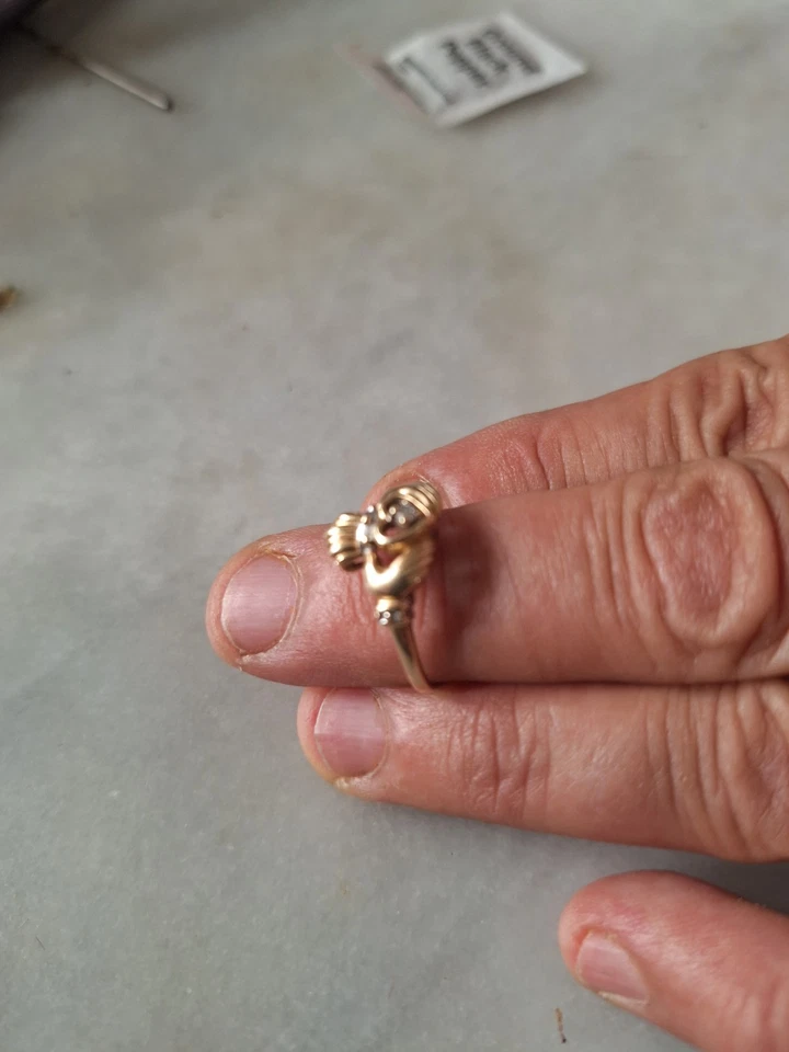 10 Karat Golden Ring with A Small Diamond Size 6 -7 - Image 1 of 4