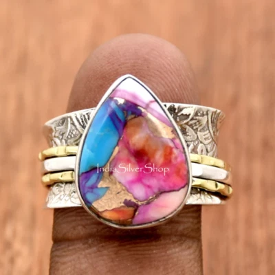 Anillo Turquesa Rosa Giratorio Banda Ancha Texturizada Banda Inquietud Para Ella Foto 1 de 4
