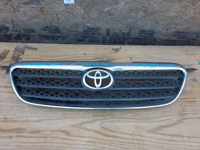 Toyota Corolla 2004-2008 parrilla central delantera uso OEM Foto 1 de 4