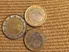 1.  One Euro Coin 2002 Austria. 2. 2002 Eagle 2 euro Coin. 3.  One Euro coin Esp