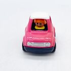 TOMY 1991 Car Toy Vintage Kids Pink and White Little Person Yellow Shirt Smiley